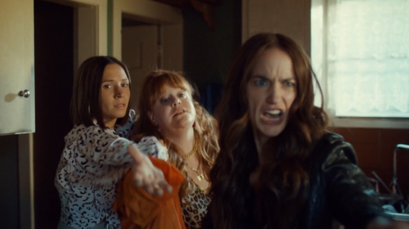 Waverly holds Ginny back while Wyonnna yells after Doug