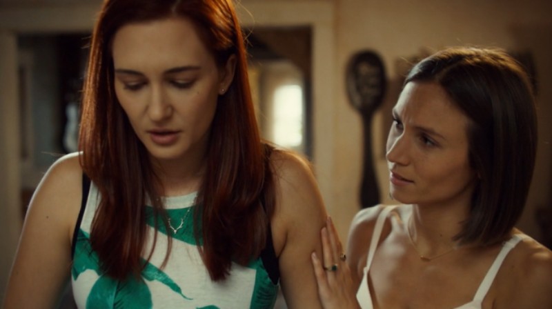 Waverly puts a comforting hand on nicole's shoulder 