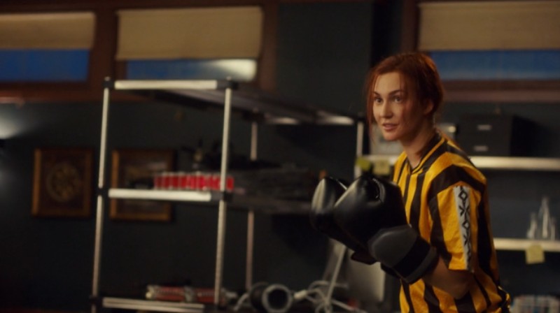 Nicole looks exhausted but holds her boxing gloves up ready for whatever Wynonna is going to throw next.