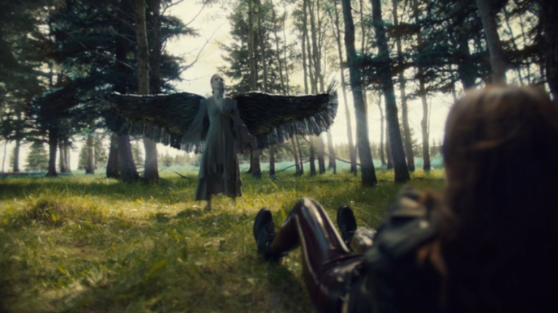 Waverly spreads her darkened wings.