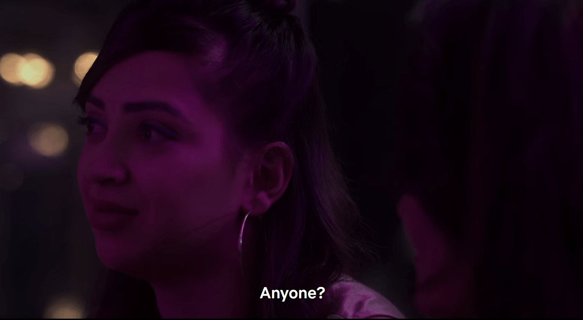 Bombay Begums queer storyline: Ayesha looks away, her face lit by purple lighting in the bar and asks the question 'Anyone?'"