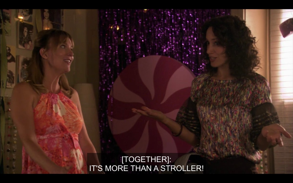 Bette and Tina presenting the stroller