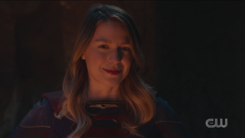 Supergirl smiles in the shadows of the Phantom Zone