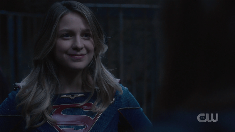 Supergirl smiles at Nyxly.