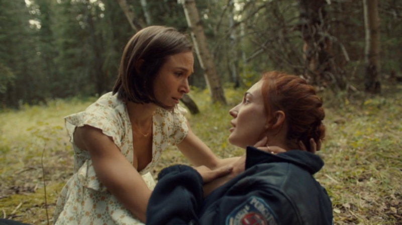 Waverly and Nicole look lovingly into each other's eyes.