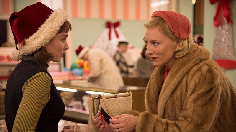 Good First Date Movies for Lesbians: Carol and Therese share a moment in a department store