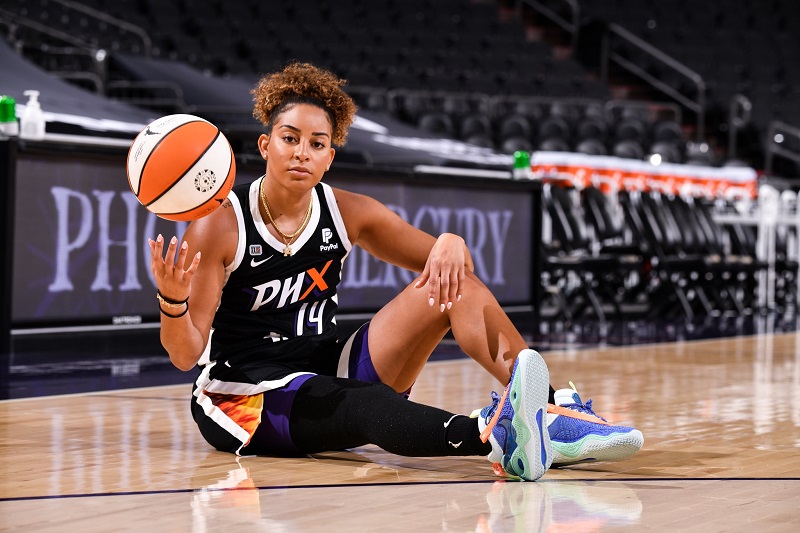 Mercury Guard Bria Hartley shows off the team's new Rebel Edition jerseys.