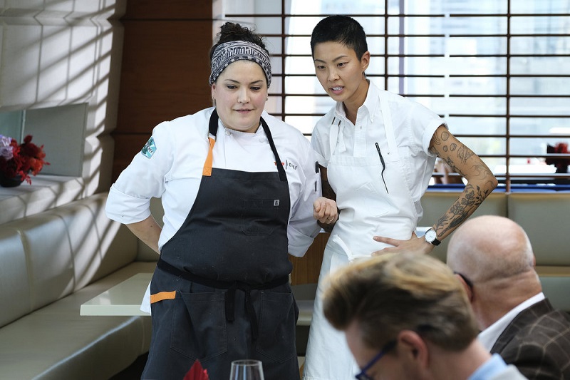 Maria and Kristen awaait word from the judges about their dishes, this week on "Top Chef."