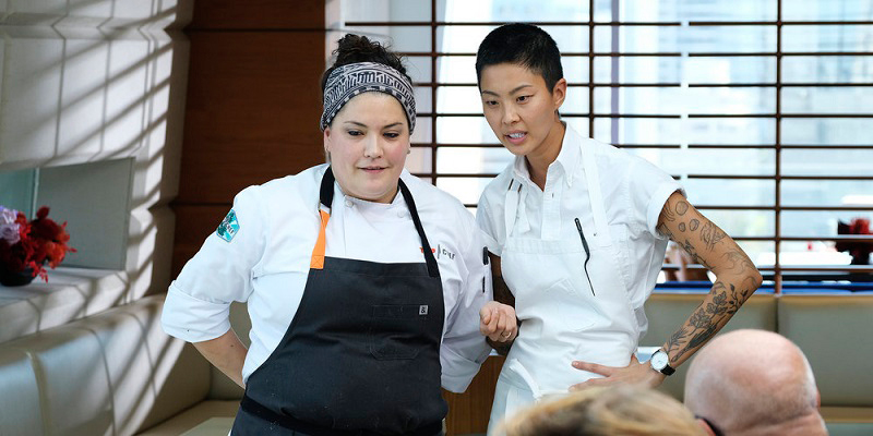 Maria and Kristen awaait word from the judges about their dishes, this week on "Top Chef."