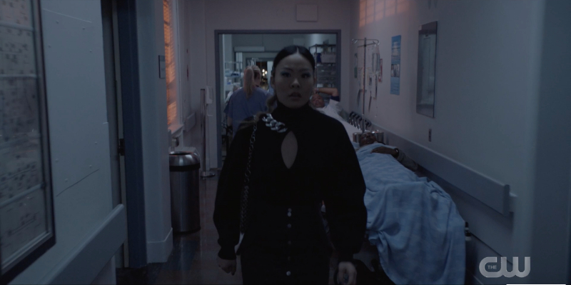 Mary walks down a hospital hallway