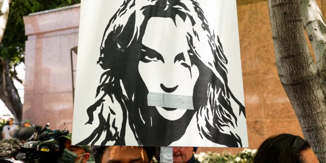 A sign of Britney Spears face with her mouth tapped over