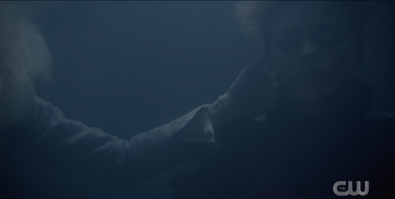 Alice pulls Kate out from under the water