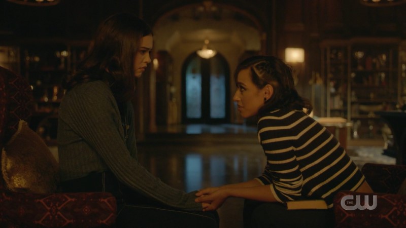 Legacies: Finch holds Josie's hands supportively. 
