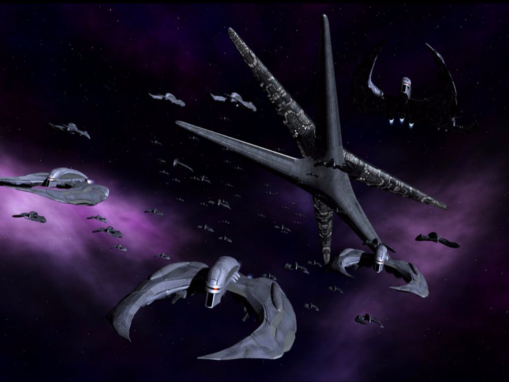 A fleet of really scary looking spaceships against a black and purple space backdrop