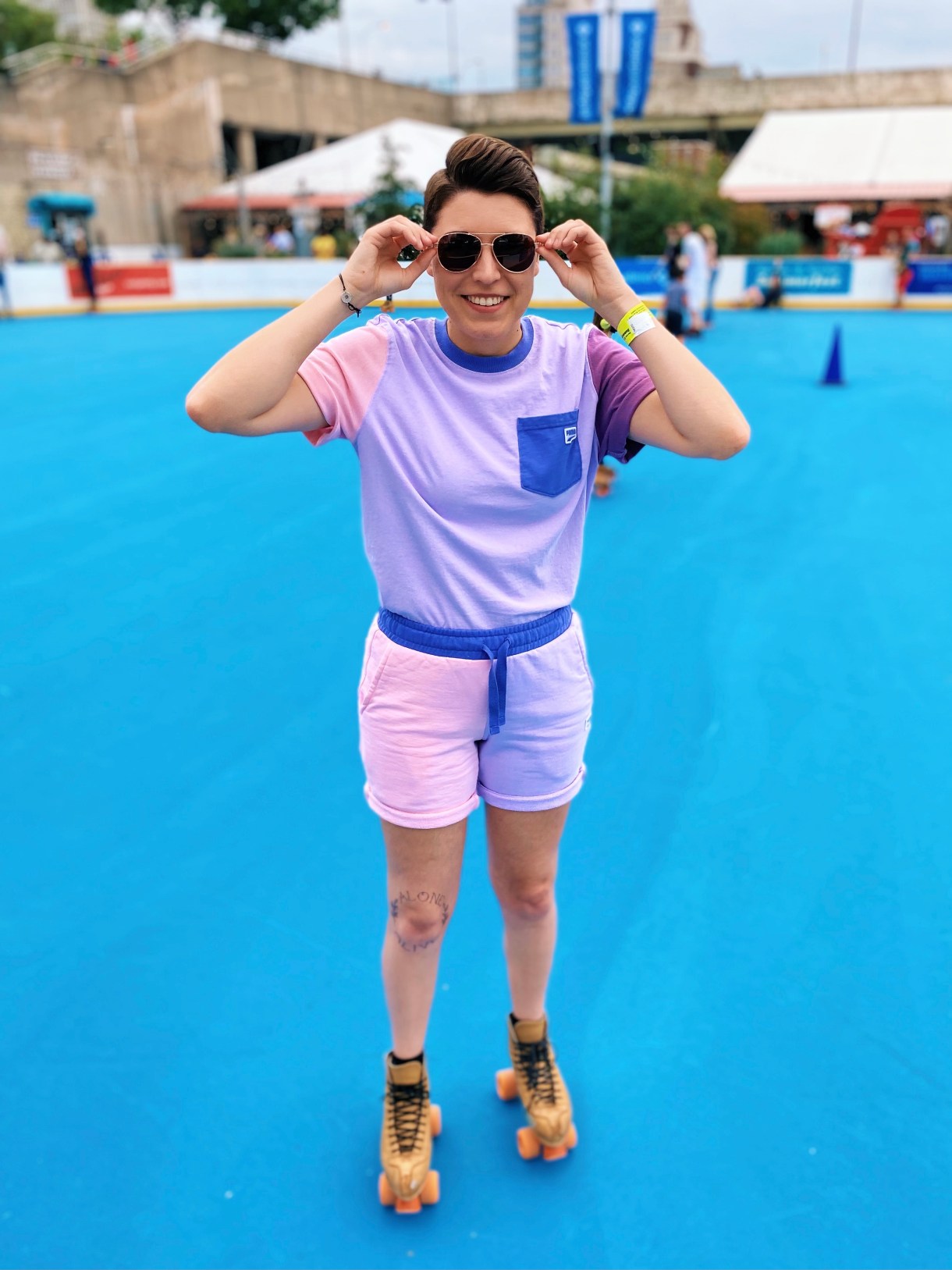 Jackie in rollerskates and sunglasses