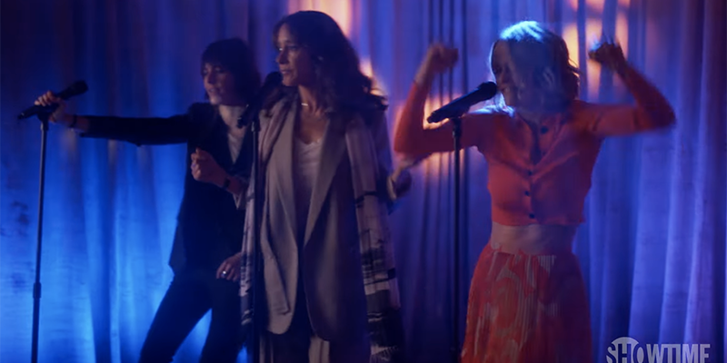 Shane, Alice, and Bette perform karaoke on stage during season two of The L Word: Generation Q