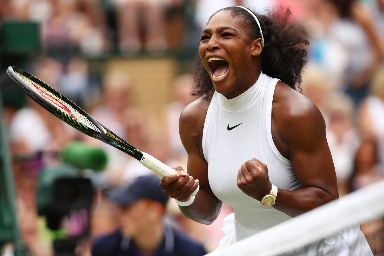 Serena Williams, the greatest athlete of all time, pumping both fists and crying out after a victorious point