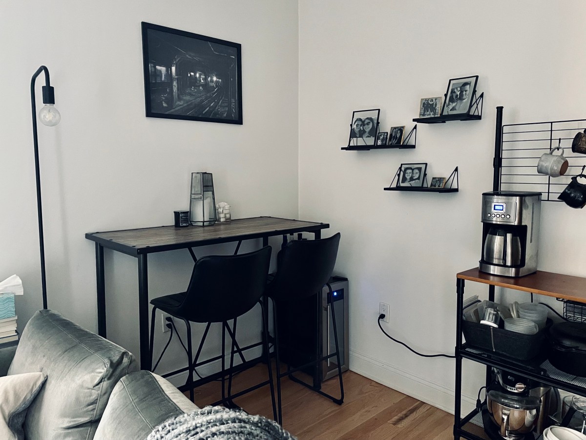 Alternate angle of the previous scene, with the bar table against the far wall and tucked into the corner.