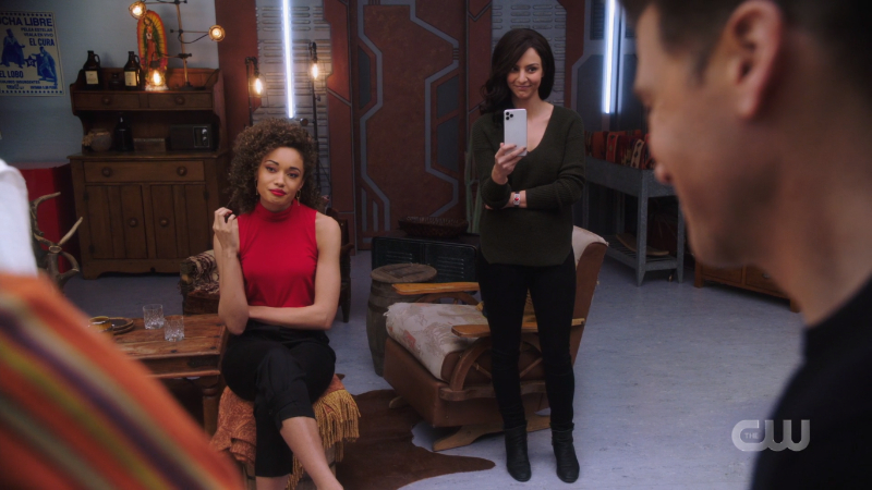 Astra and Original Zari look amused by the boys' antics; Zari is filming it on her phone.