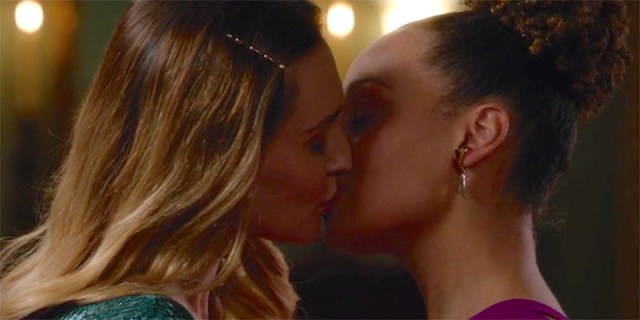 Kat Barrell and Kyana Teresa kiss on Hallmark's The Good Witch