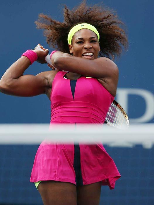 Serena Williams, the greatest athlete of all time, following through a shot after a devastating return