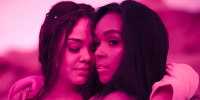 Janelle Monae and Tessa Thompson hug in the music video for PYNK