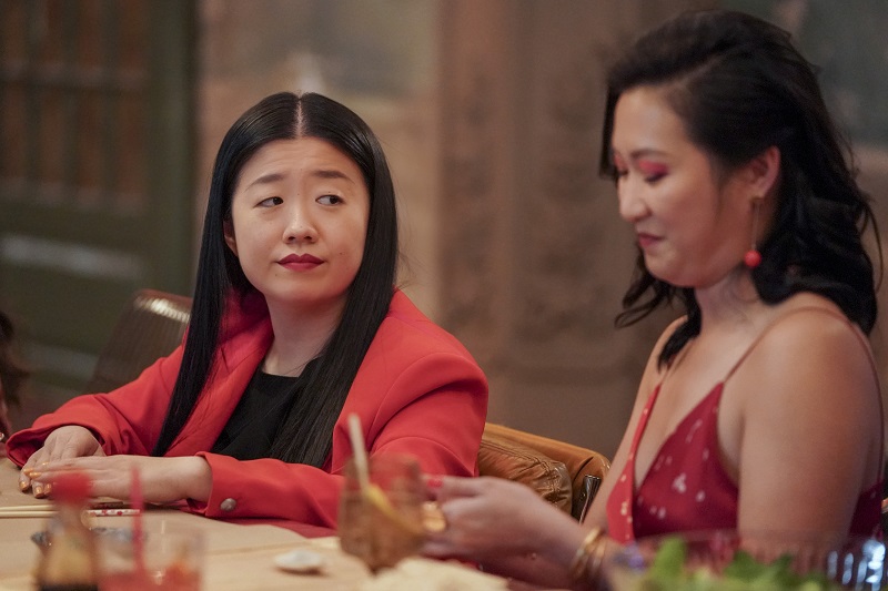 Alice and Sumi try their hand at making dumplings during the Coterie's Lunar New Year celebration.