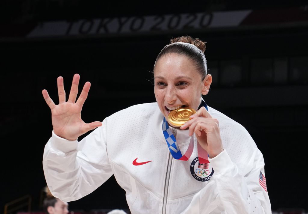 Diana Taurasi of the United States poses for photos after the women's basketball final between the United States and Japan at the Tokyo 2020 Olympic Games in Saitama, Japan, Aug. 8, 2021. (Photo by Meng Yongmin/Xinhua via Getty Images)