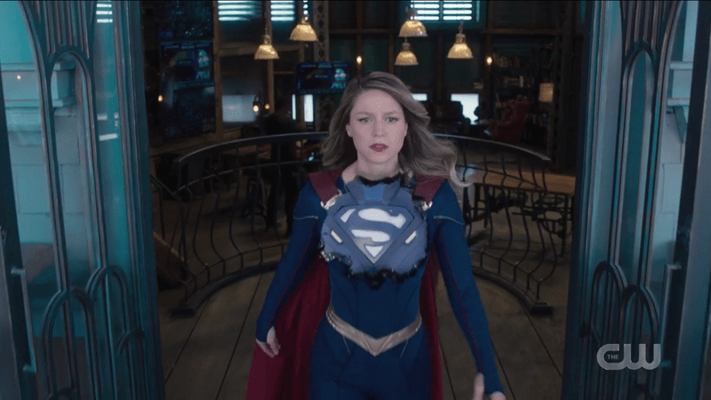 Kara storms off the balcony while Lena's suit spreads over her chest...wanky