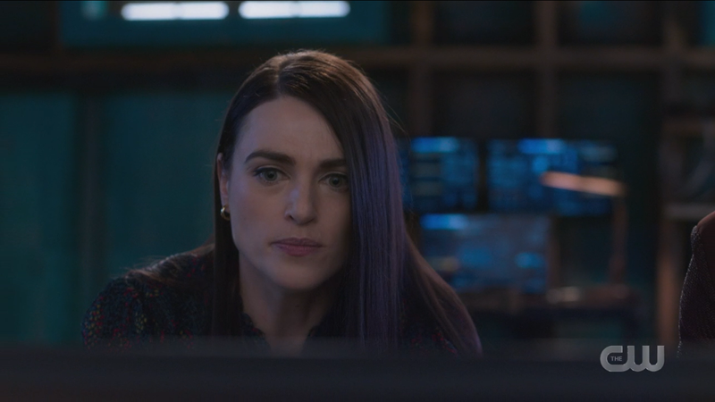 Lena looks at her computer as she saves the whole damn day