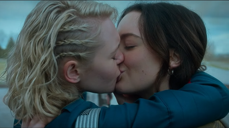 Screenshot from Motherland: Fort Salem of lesbian witches Raelle and Scylla kissing