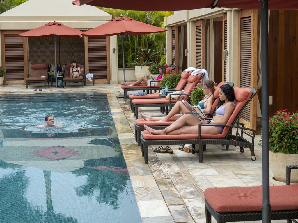 Shane, who is on his honeymoon, swims up next to Olivia and Paula