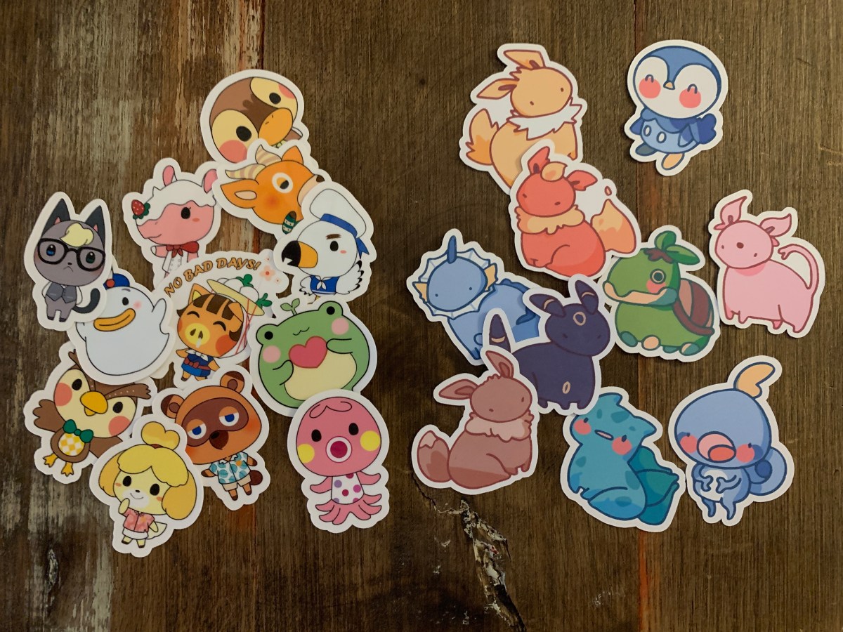 A selection of Pokemon and Animal Crossing stickers in pastel colors