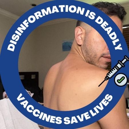 Jay, a shirtless person with short black hair and facial stubble, turns their head over their shoulder. Their face is obscured by a blue circle that includes the words, "Disinformation is deadline - vaccines save lives" and the image of a shot and check mark.