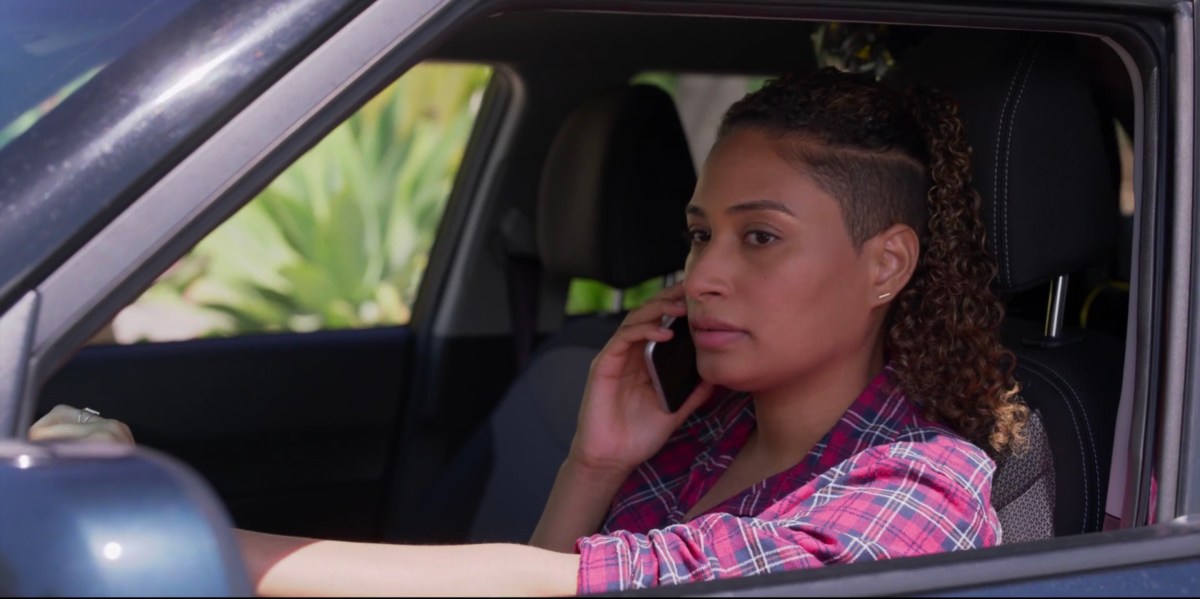 Sophie on the phone in her car