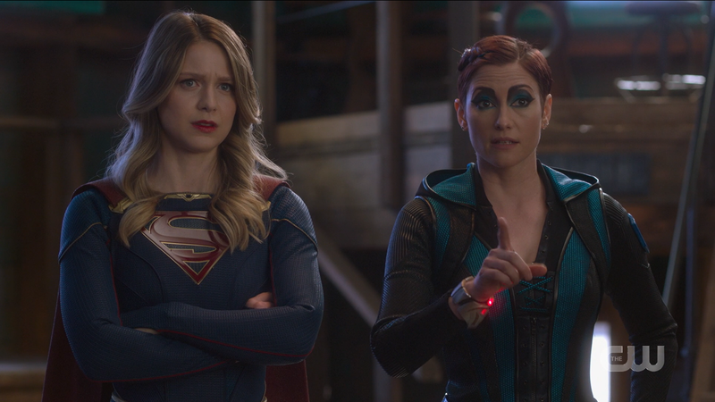 Supergirl 611 recap: Kara crosses her arms and Alex points as they both wear "let me get this right" faces.