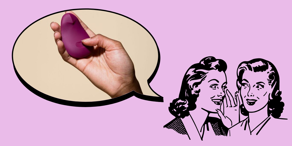 Against a pink background, there is a drawn image of two women with 1950s hairstyles appear in the bottom right corner. One is whispering to the other, and a thought bubble appears above her head. Inside the thought bubble, there is an image of a hand holding a small, magenta vibrator, which is shaped a bit like a computer mouse.