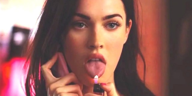 A still of Megan Fox in Jennifer's Body using her tongue on a lighter
