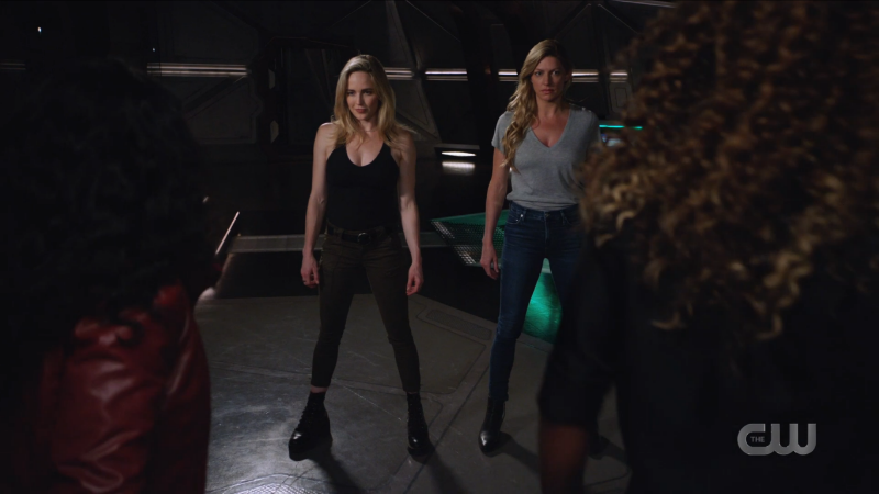 Sara and Ava stand side by side, ready to fight