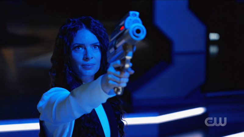 Human Gideon points her laser gun at Blue Gideon