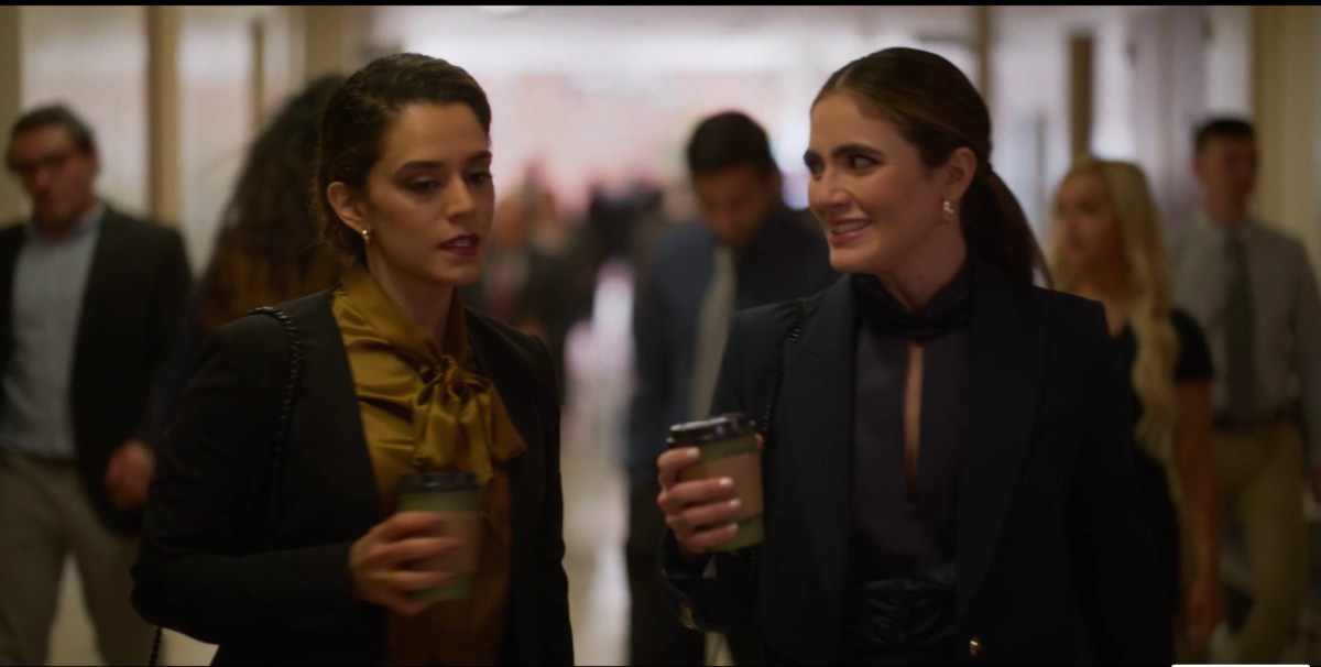 Gigi and Dani in fancy outfits in the building