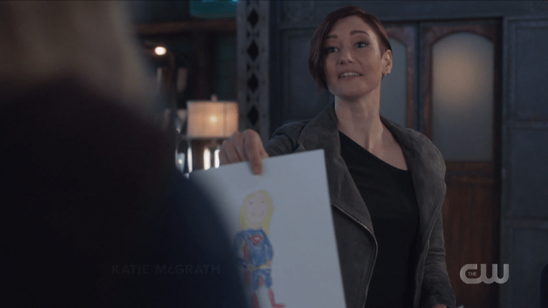 Alex proudly produces a drawing of supergirl