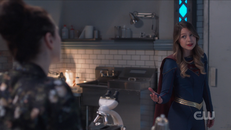 Kara holds out her hand to Lena