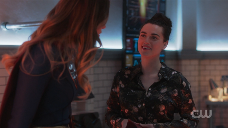 Lena beams at the newly awake supergirl