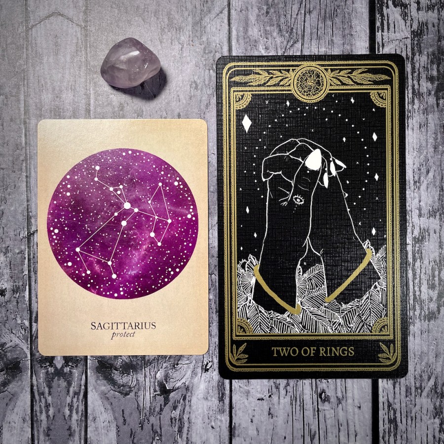two of rings/pentacles from the marigold tarot