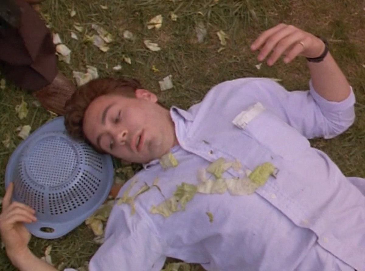 Reed on the ground with salad