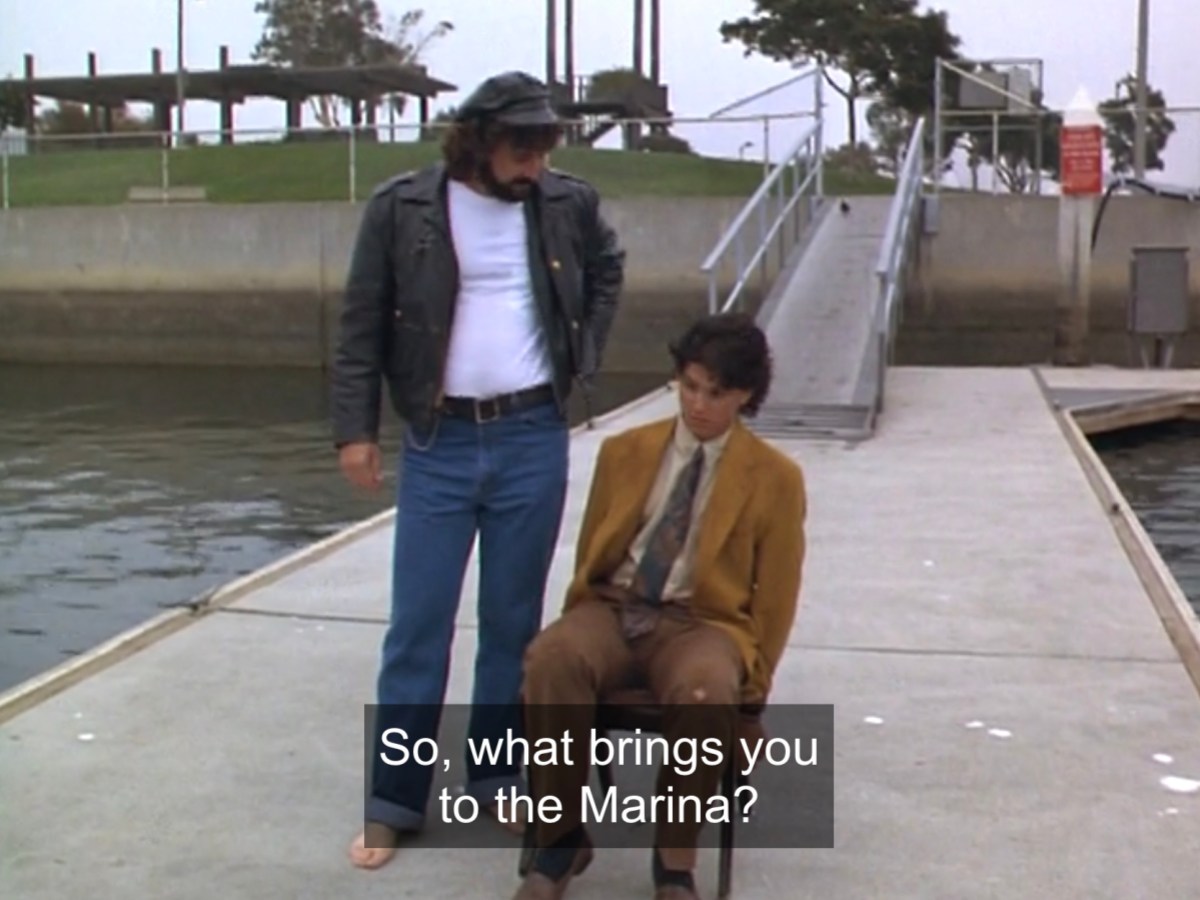 George asks Frank Jr what brings him to the marina, Frank Jr is in his chair