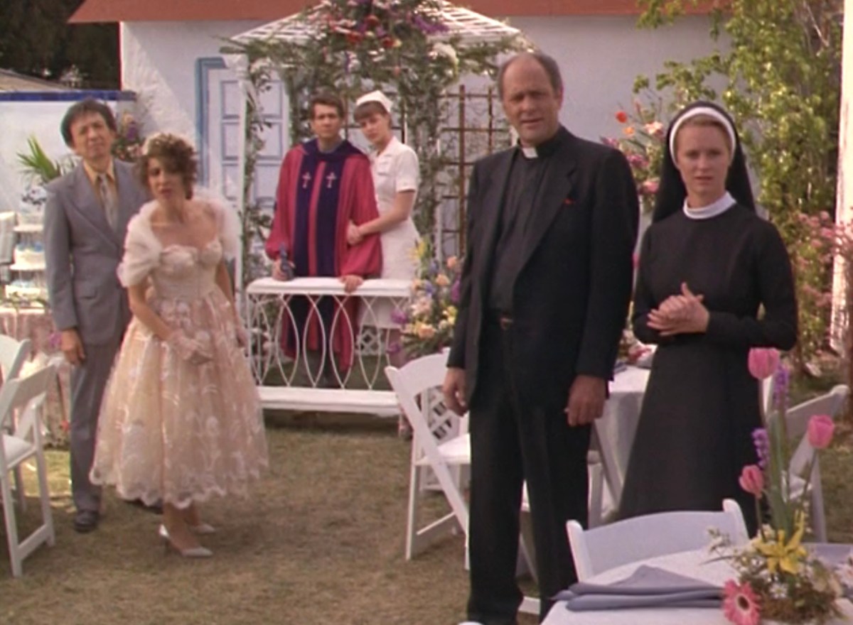 Bitsy, Frank Sr, Fuzby, Nurse Nelly, Father Kelly and Sister Agnes look at the people who just walked in