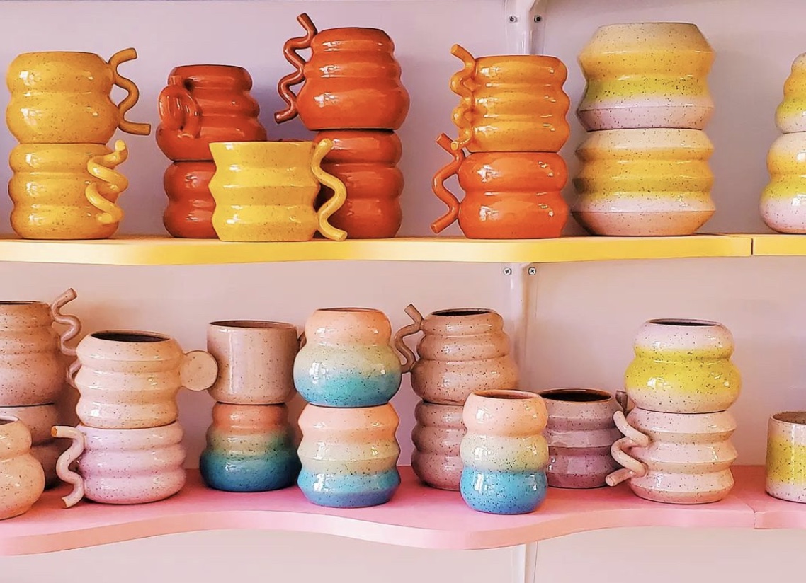 Beautiful mugs on shelves
