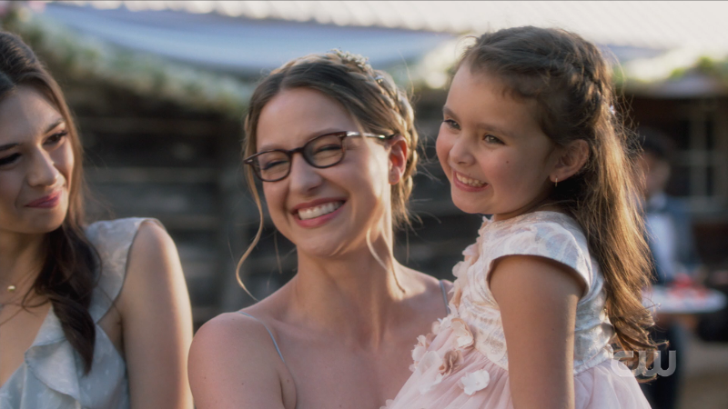 Supergirl series finale: Kara holds Esme and they both smile cutely